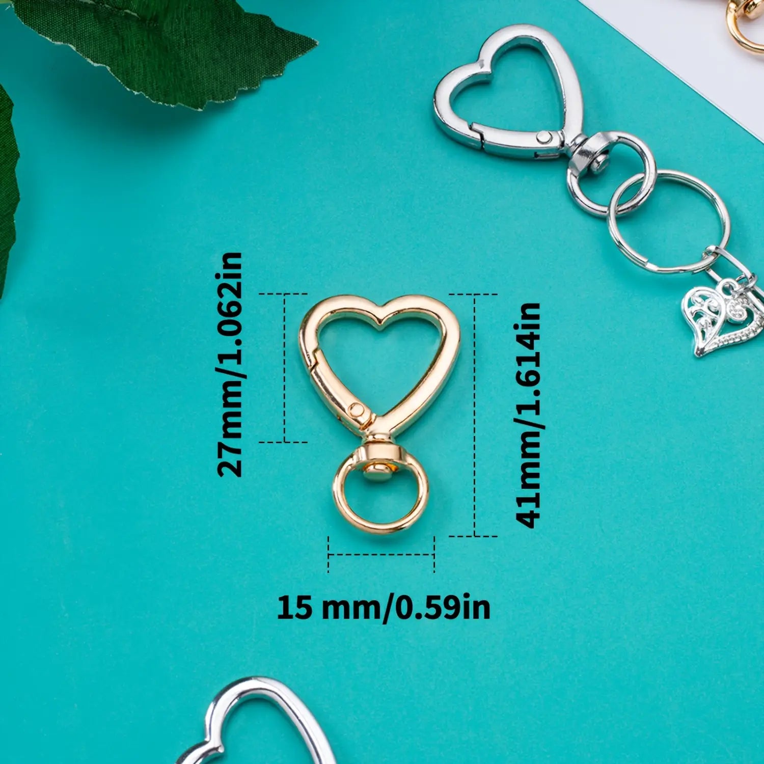 Gold heart-shaped keychain clip with swivel mechanism and attached ring from heart keychain 3pack enamel gold heart clasp ring product.