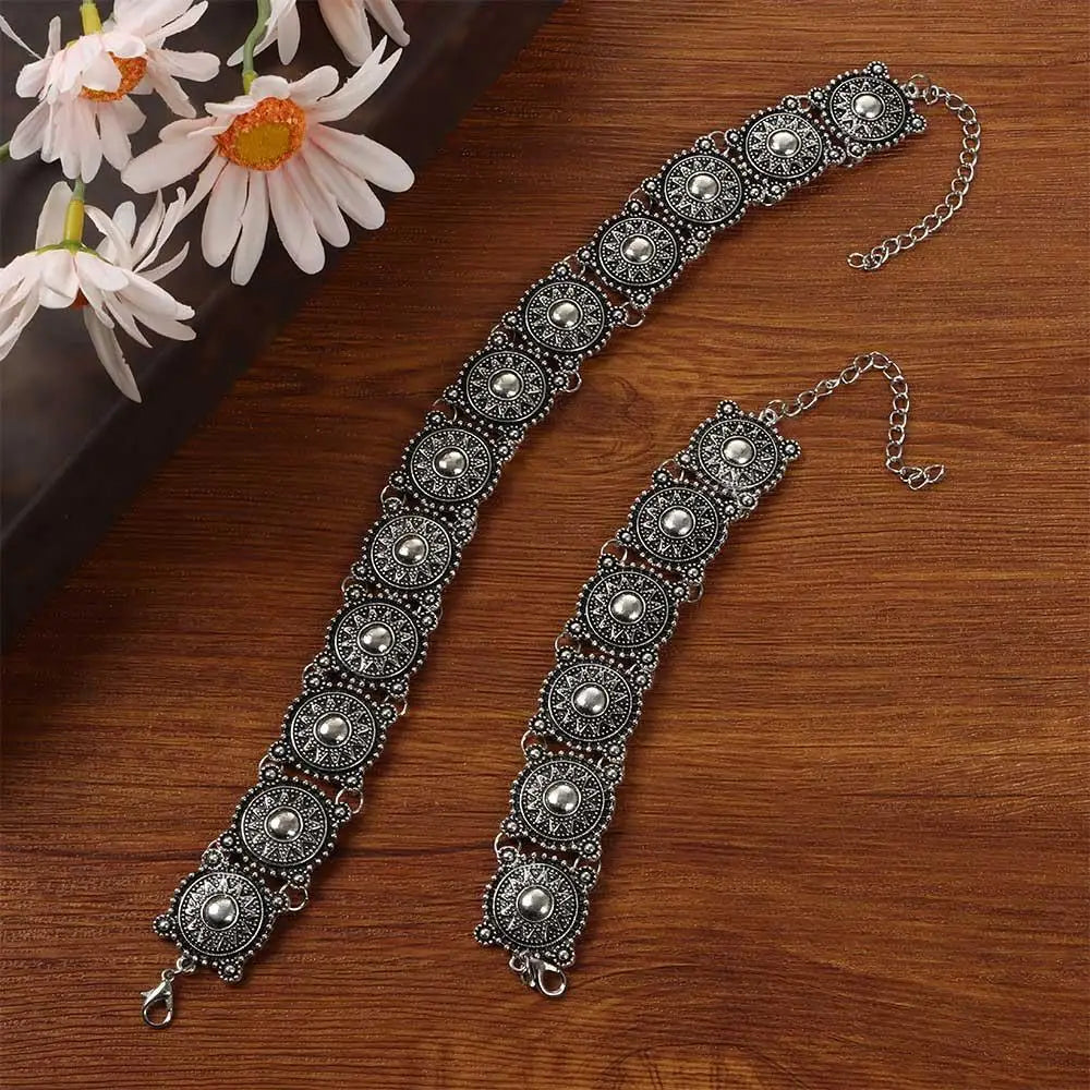 Boho silver vintage jewelry set silver-toned ornate choker-style bracelet featuring intricate circular medallions with central beads and beaded borders.