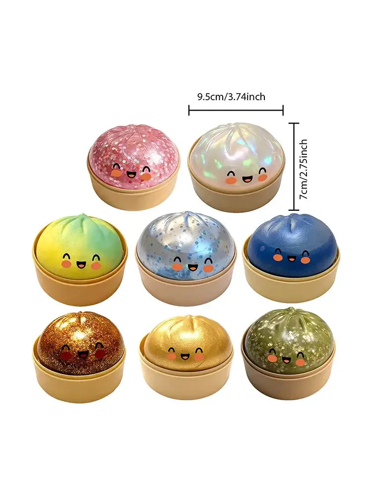 juguete exprimible de panecillo al vapor colorido y con purpurina, con forma de bollito, con caritas sonrientes y cuerpos de silicona suaves, exhibido junto con un recipiente para vapor para aliviar el estrés.