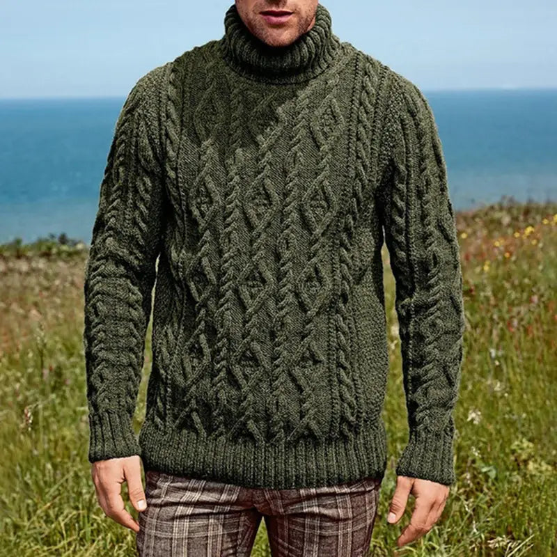 Men turtleneck cable knit sweater in olive green featuring intricate diamond and braided patterns.