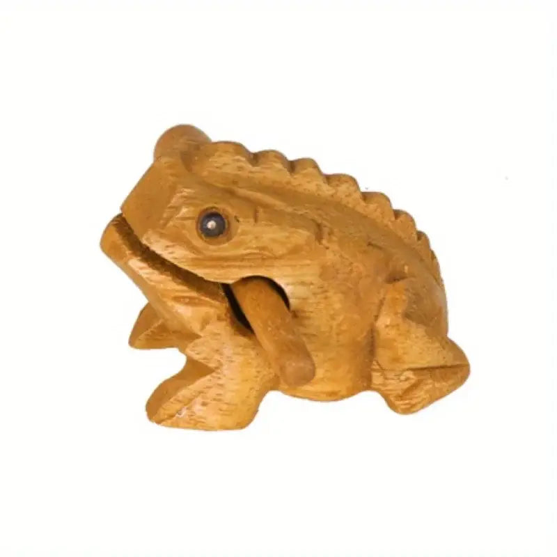 Hand carved wooden frog instrument and home decor with a smooth light brown finish and detailed texture on the frog body made from rain wood.