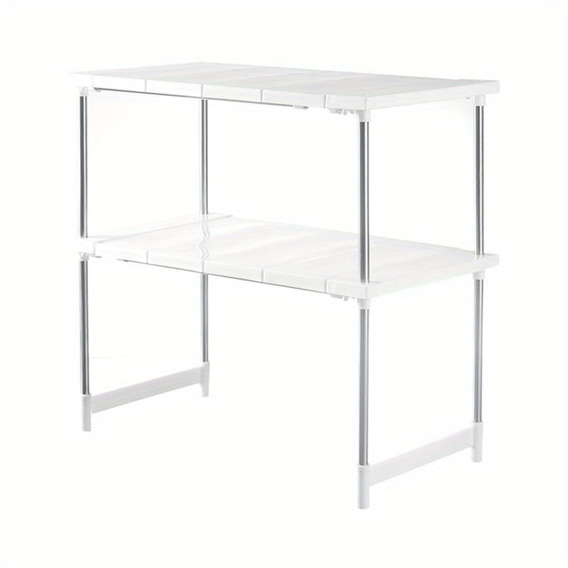 Étagère-organisateur de rangement à deux niveaux en plastique blanc avec des pieds en métal argenté, conçue comme support de rangement pour comptoir de cuisine et support de rangement.