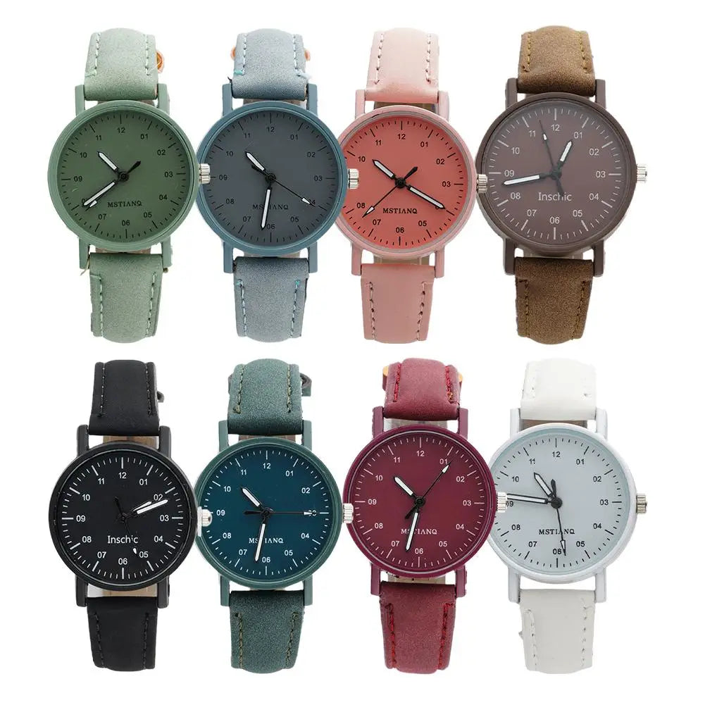 A collection of eight women quartz watches with minimalist analog round faces featuring simple black numerals and hands, paired with soft-colored pu leather waterproof straps in sage green, dusty blue, blush pink, brown, black, teal, burgundy, and white.