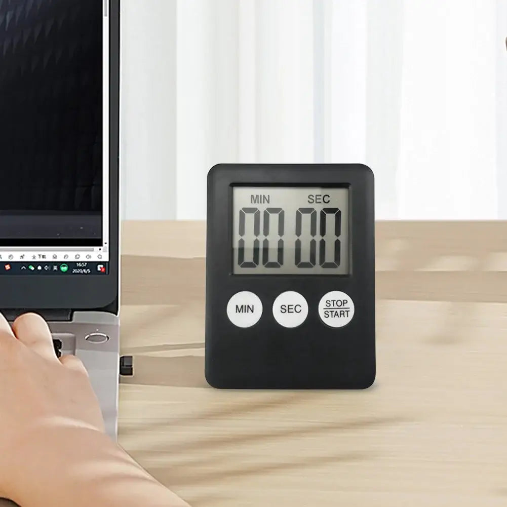 black digital kitchen timer magnetic stopwatch with rectangular display showing minutes and seconds and three white circular buttons labeled min sec and stop start below the screen
