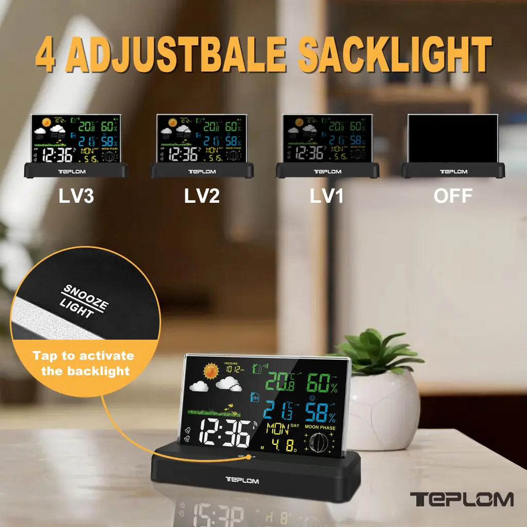 Black digital wireless weather station with colorful backlight displaying time indoor and outdoor temperature humidity and moon phase on a sleek rectangular screen powered by lr6 aaa batteries.