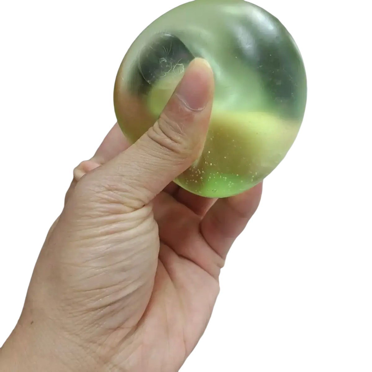 A translucent green squishy stress ball with glitter particles and slow rebound for sensory fidget use