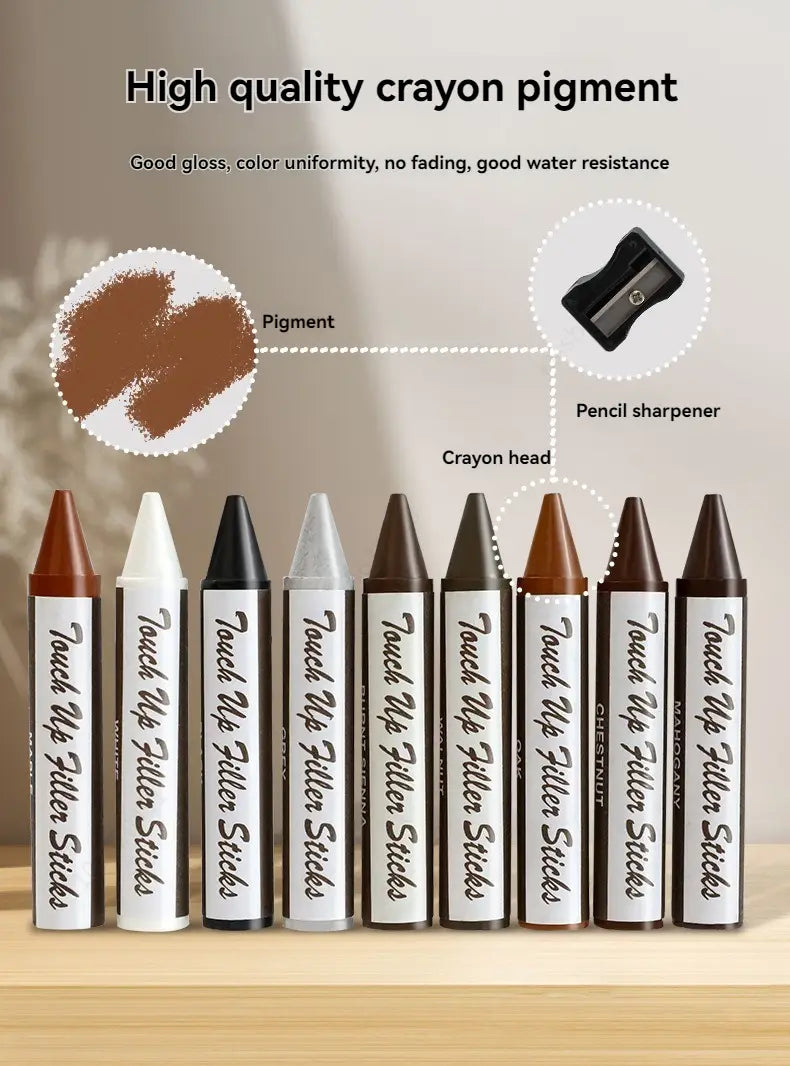 Un ensemble de marqueurs de réparation pour meubles en bois comprenant des bâtonnets de mastic de retouche de couleur brune, blanche, noire et argentée, pour l’élimination des rayures et la restauration des meubles.