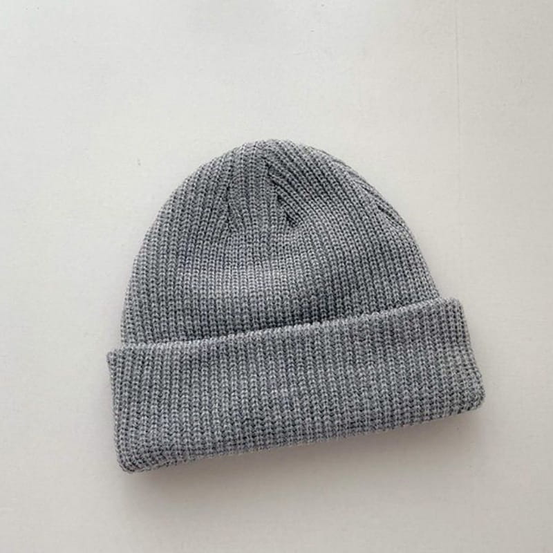 A soft heather gray ribbed knit winter beanie hat with a folded cuff designed as a warm unisex cap.