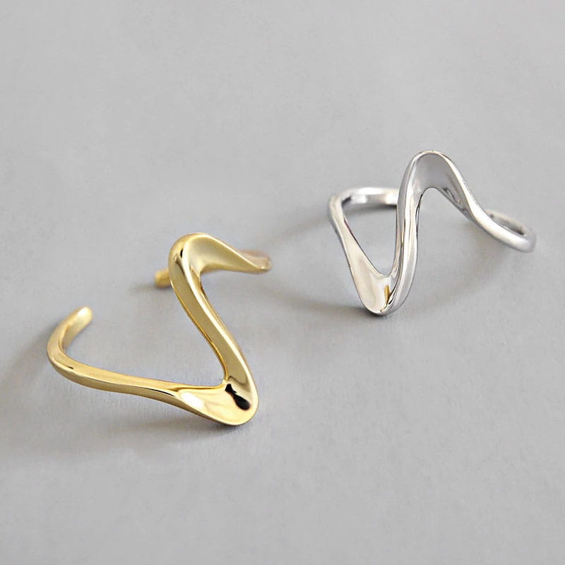 Sterling silver open ring for women featuring gold and silver wave-shaped ear cuffs with a sleek and modern design.
