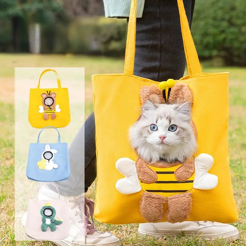yellow bee-themed pet carrier bag canvas tote with plush fuzzy wings and antennae designed for small dogs and cats with mouth length access.