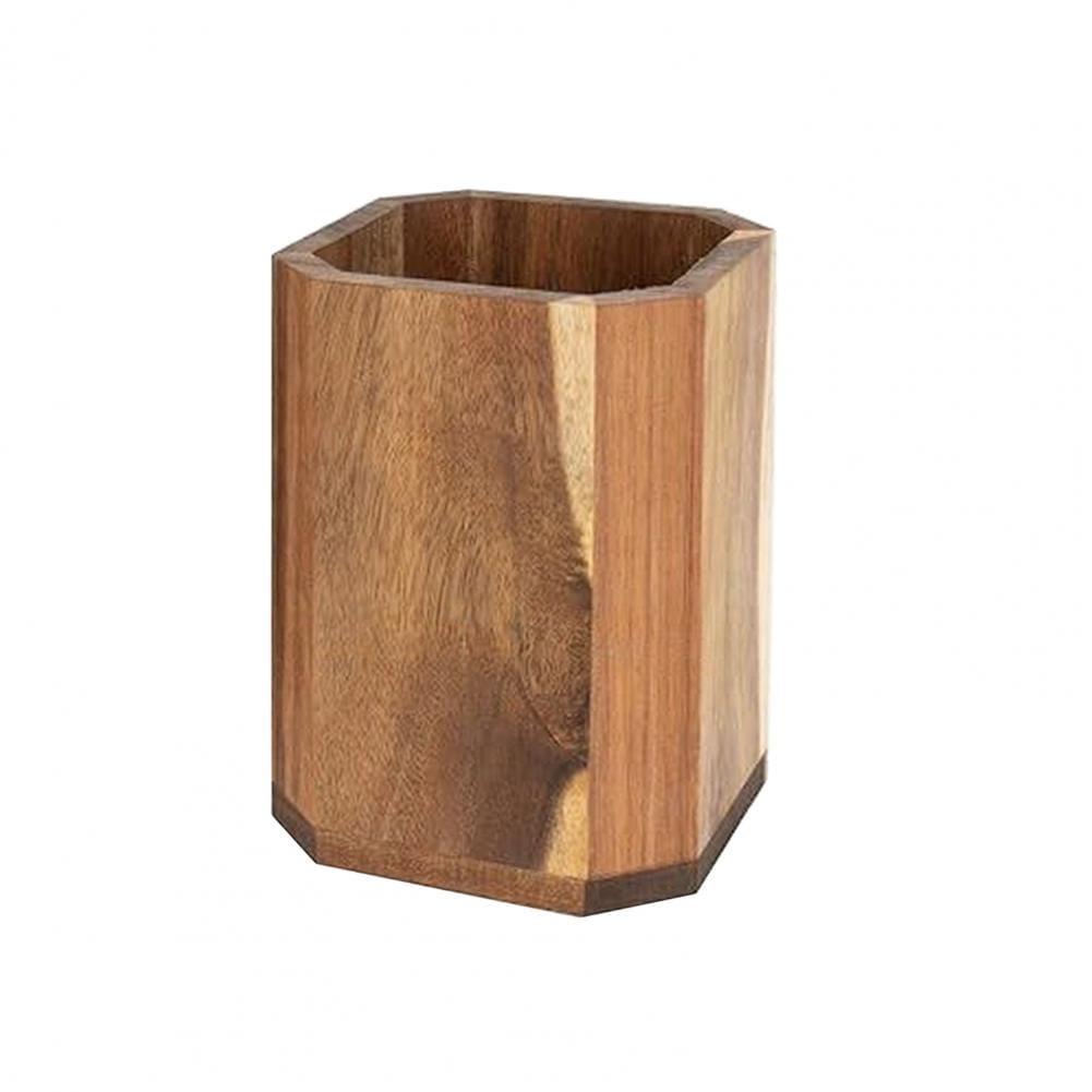 A hexagonal wooden rotating kitchen utensil holder with a natural wood grain finish in varying shades of light to dark brown for countertop organization.