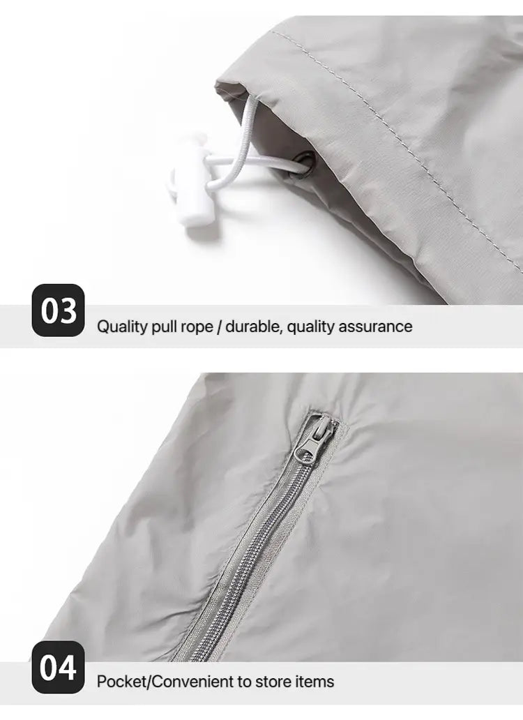 Men sun protection windbreaker jacket in light gray featuring a water-resistant material with a white drawstring toggle and silver zipper.
