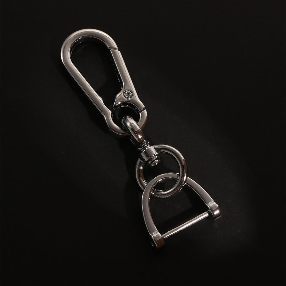 Silver-toned metal car key clip carabiner keychain featuring a durable carabiner clip and an attached horsebit-style ring.