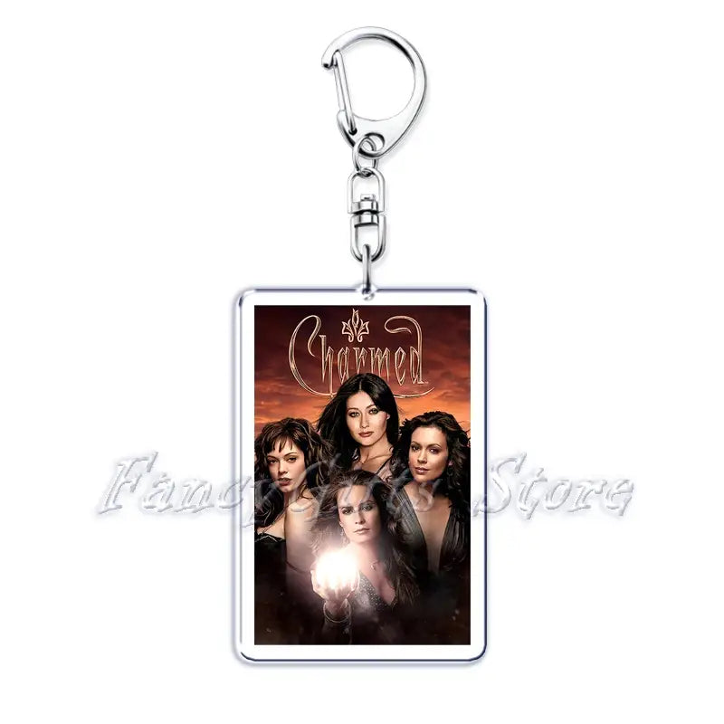 Rectangular acrylic keychain from the movie poster acrylic keychain set featuring the charmed tv show logo and characters on a dark fiery background.