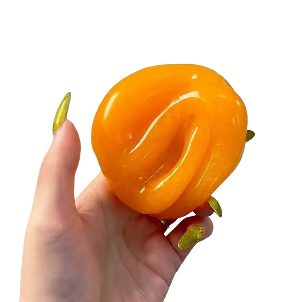 Handmade orange slushy squishy toy with vibrant orange glossy slime and subtle swirl patterns viewed from the front