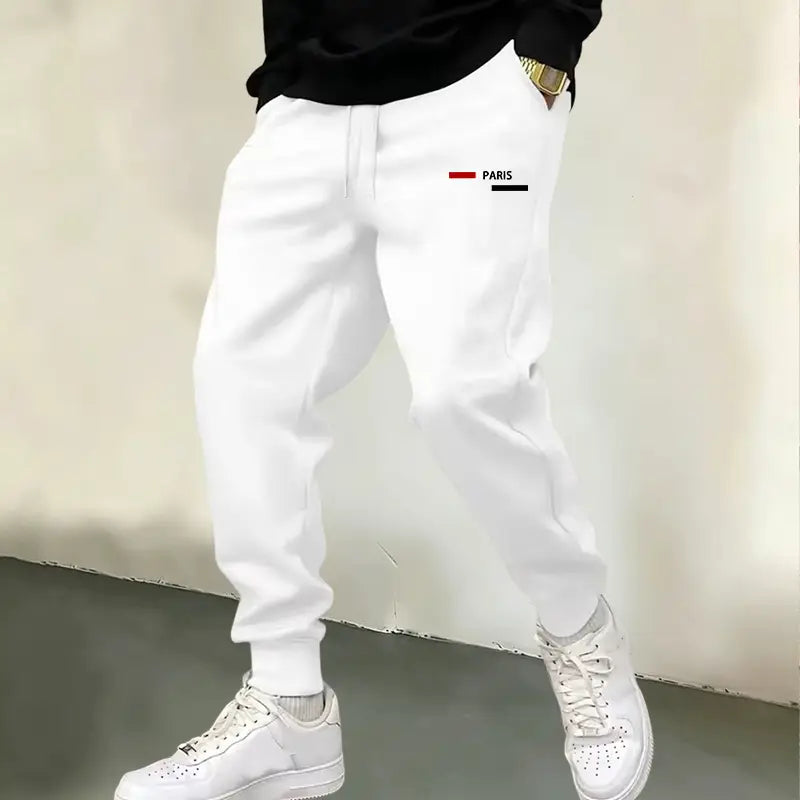 Weiße Baumwoll-Jogger-Sweatpants für Herren mit Paris-Logo: minimalistisches Paris-Logo-Patch auf dem linken Oberschenkel.
