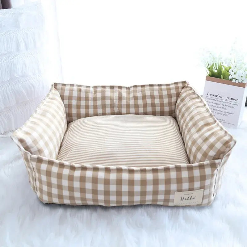 beige and white checkered plush gingham check pet bed made of cotton with a striped cushion for dogs