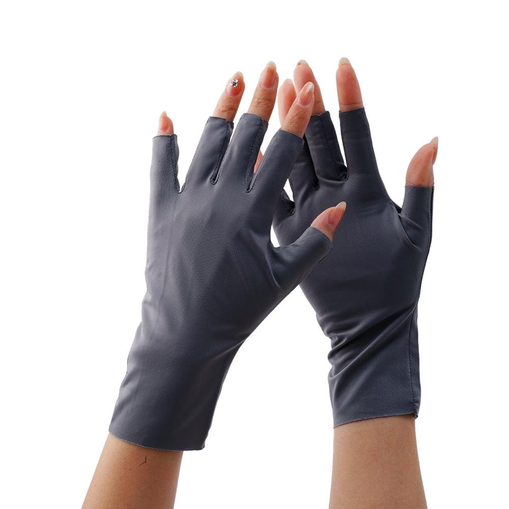 A pair of dark gray fingerless sunscreen driving gloves made from smooth stretchy fabric showing the back side.