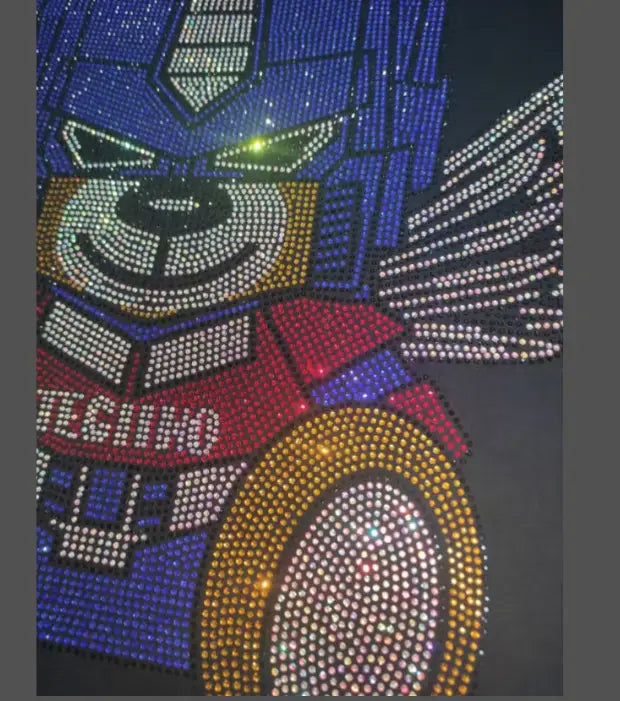 Men rhinestone devil bear graphic tee featuring a sparkling blue red and gold rhinestone-embellished teddy bear design with a robotic face.