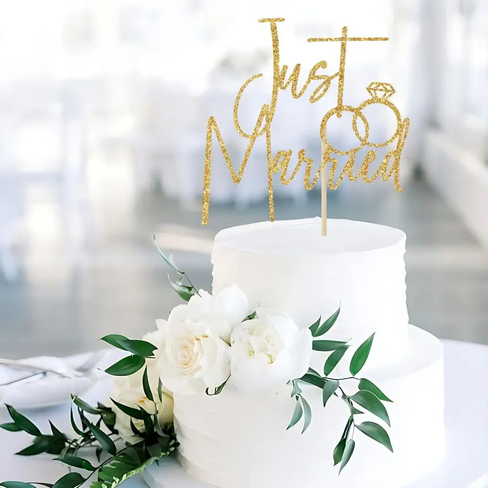 Just married gold glitter cake topper featuring a diamond ring design for wedding cake decoration.