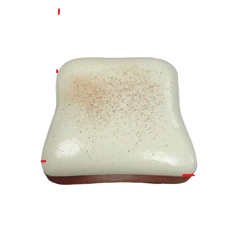 Cream-colored ceramic tile with speckled surface and rounded edges for 1t-bread butter squishy stress relief toy