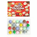 A festive red and yellow merry christmas gift box containing 23 colorful dumpling stress balls in a christmas dumpling advent calendar