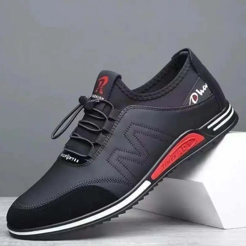 Men casual leather sneakers lightweight non slip shoes with black mesh upper and rubber sole featuring red and white accents.