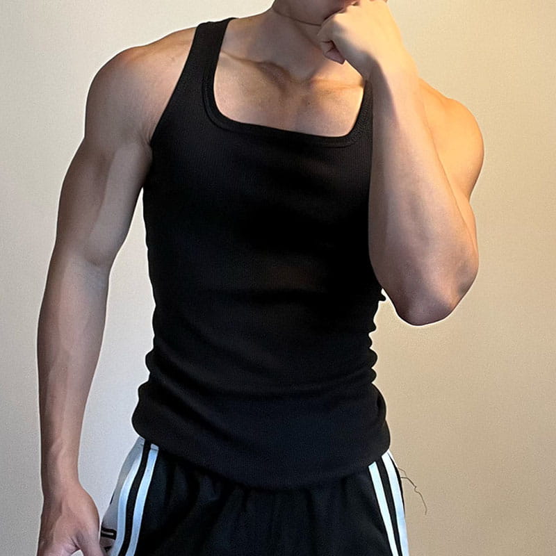 Men solid color casual black ribbed tank top with square neckline ideal for everyday wear.