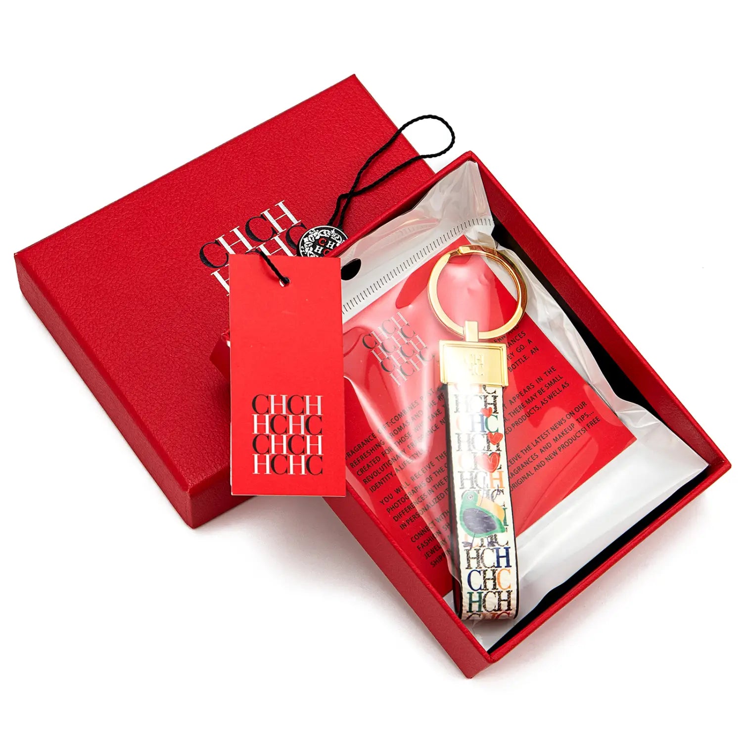 A festive red and gold leather logo keychain featuring a colorful repeating choc pattern on its strap designed as a designer fashion accessory gift.