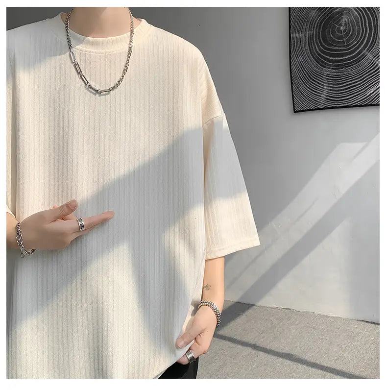 off-white ribbed cotton men striped oversized summer t-shirt with short sleeves and crew neck displayed.