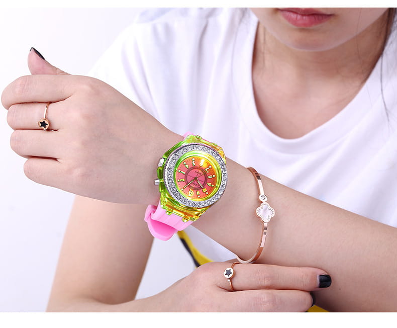 Vibrant lime green and pink led luminous silicone watch rhinestone digital timepiece with a sparkling silver bezel and colorful dial.