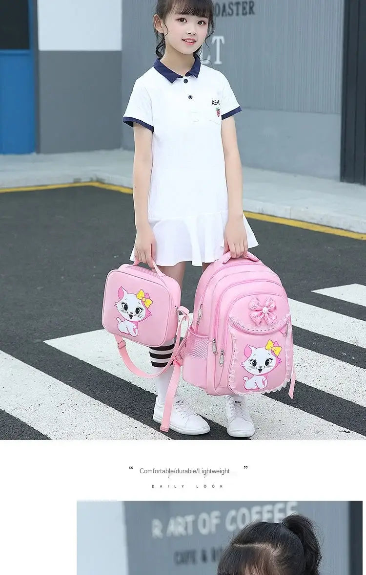 Rosa Katzen-Schulrucksack-Set für Mädchen mit einem rosa katzenmotivierten Design, einschließlich Rucksack und passender Lunchbox, ideal für die Schule.