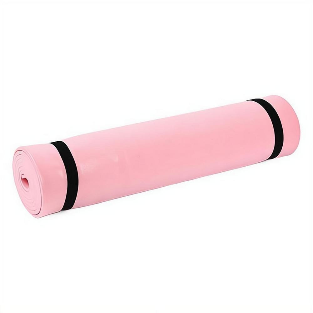 Pink portable EVA exercise mat made of foam with black elastic straps for fitness and camping use.