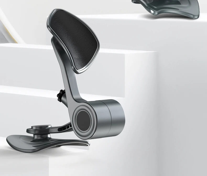 A sleek modern black and silver ergonomic pelvic floor muscle trainer and buttock exerciser with a padded headrest for neck support.