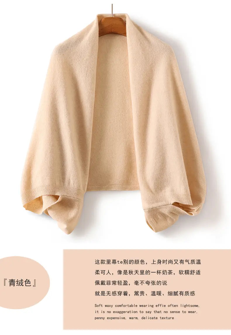 女性向けベージュのウールショールラップスカーフ。柔らかく軽量なカシミヤで作られ、居心地のよさとエレガントなデザインを兼ね備えています。