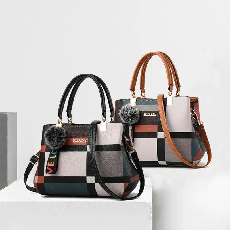 Two kuoy black crossbody handbags in style1 style2 feature a multi-colored plaid pattern with black gray beige and red tones made of pu leather adorned with black and tan handles and fuzzy pom-poms.