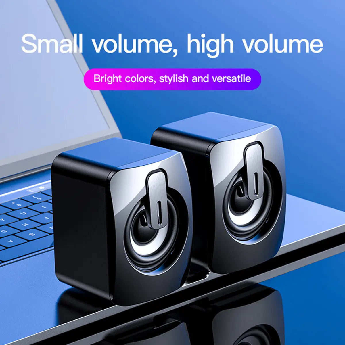 USB-Mini-Computermuslautsprecher für das Stereo-Desktop-Audiosystem mit schwarzen und silbernen, würfelförmigen Lautsprechern mit glänzender Oberfläche.