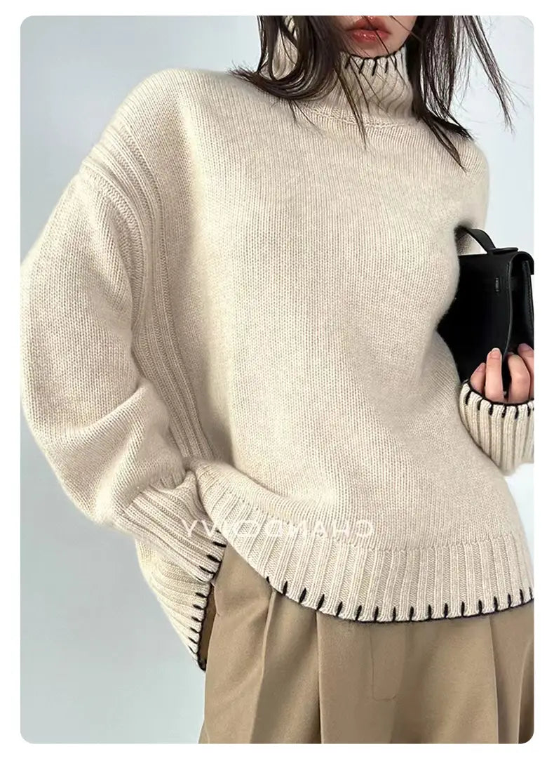 cream-colored pure wool turtleneck sweater for women featuring ribbed knit texture with a frayed hem and black contrast stitching