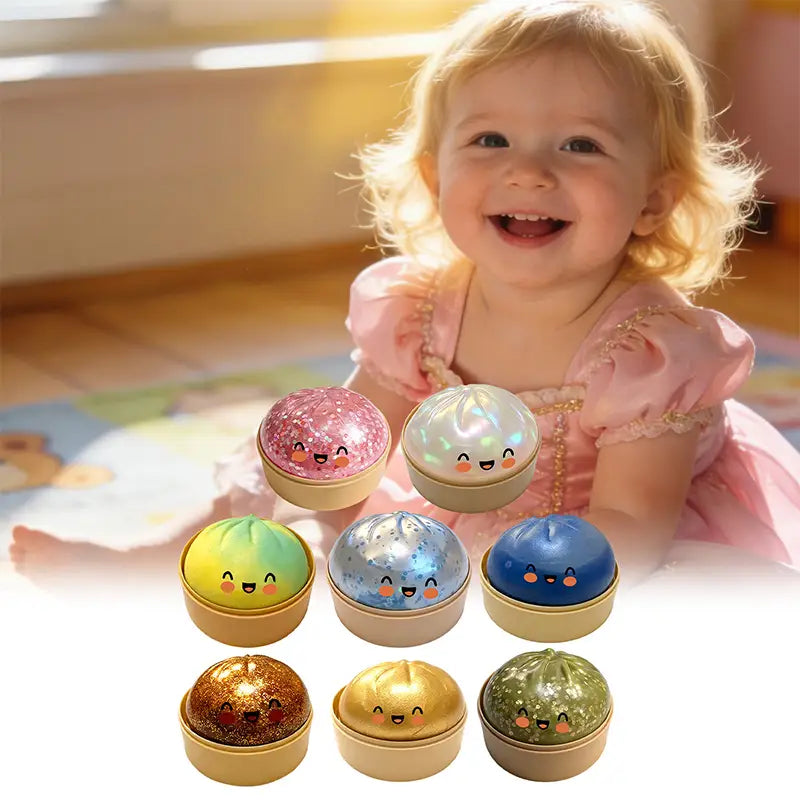 A collection of colorful glitter dumpling stress ball slow rebound toys in pink blue green and gold with smiling faces and led night lights.