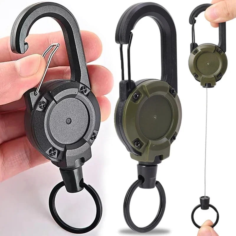 Black and olive green retractable carabiner keychains with heavy duty steel wire, featuring a sturdy metal hook, circular body secured by screws, and a pull cord ending in a ring.