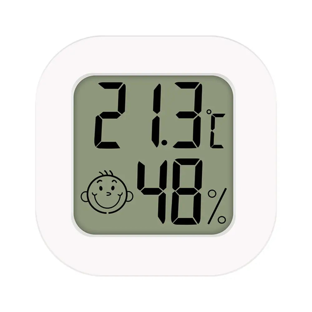 white square digital thermometer and hygrometer room sensor displaying 21.3°c temperature, 48% humidity, and a smiling cartoon face icon with a wide measurement range for indoor monitoring.