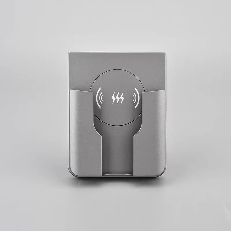 Gray metallic 15w in-wall wireless fast charger with a circular induction pad and integrated phone cradle for convenient charging.