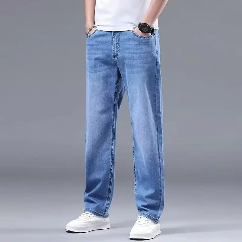 Men fleece lined winter jeans in light-wash blue denim with a loose straight-leg cut and classic stitching for warmth and comfort.