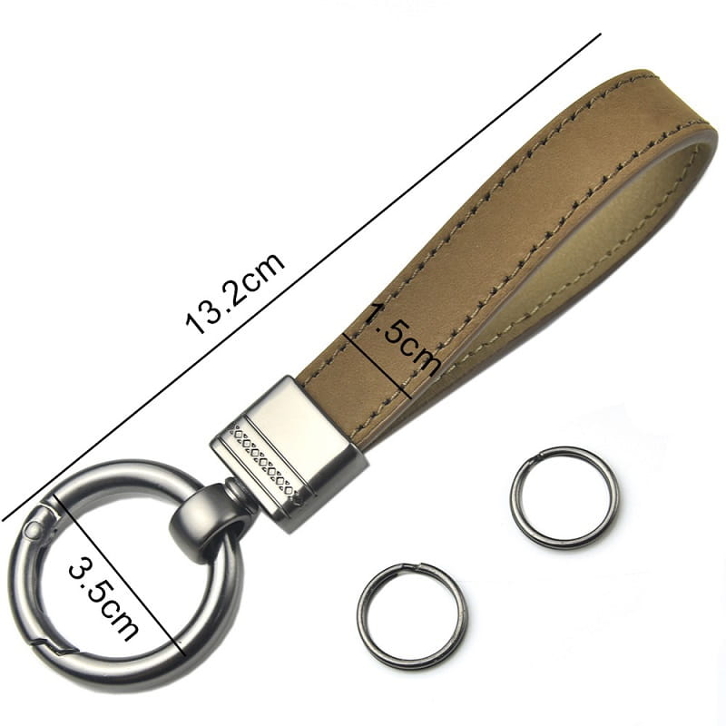 Tan leather keychain with silver metal clasp and ring featuring stitched detailing along the strap from leather keychains set multicolor metal clasp.