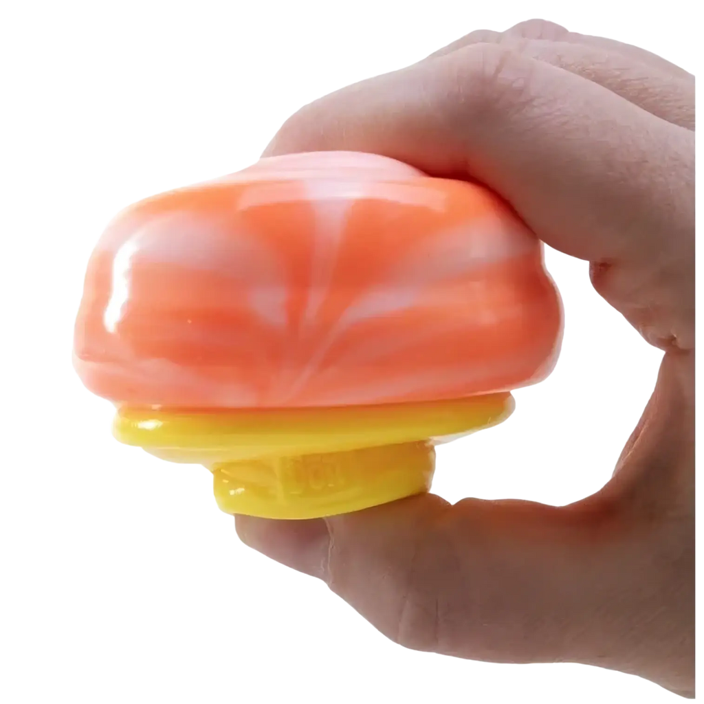 A vibrant orange and white marbled sushi roll shaped NeeDoh toy with a yellow base viewed from the front