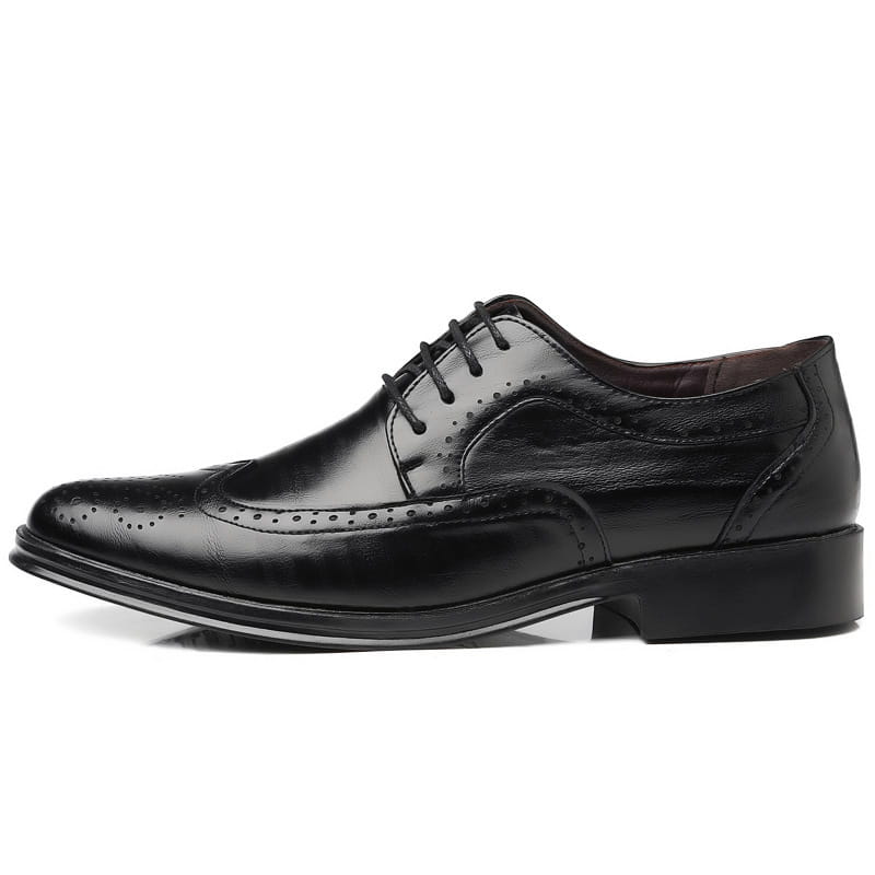Men’s black leather brogue dress shoe featuring perforated detailing and a polished finish.