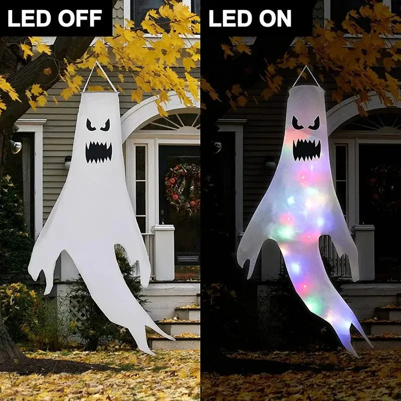 A white inflatable Halloween ghost LED hanging windsock with black facial features and glowing lights designed for home outdoor decoration.