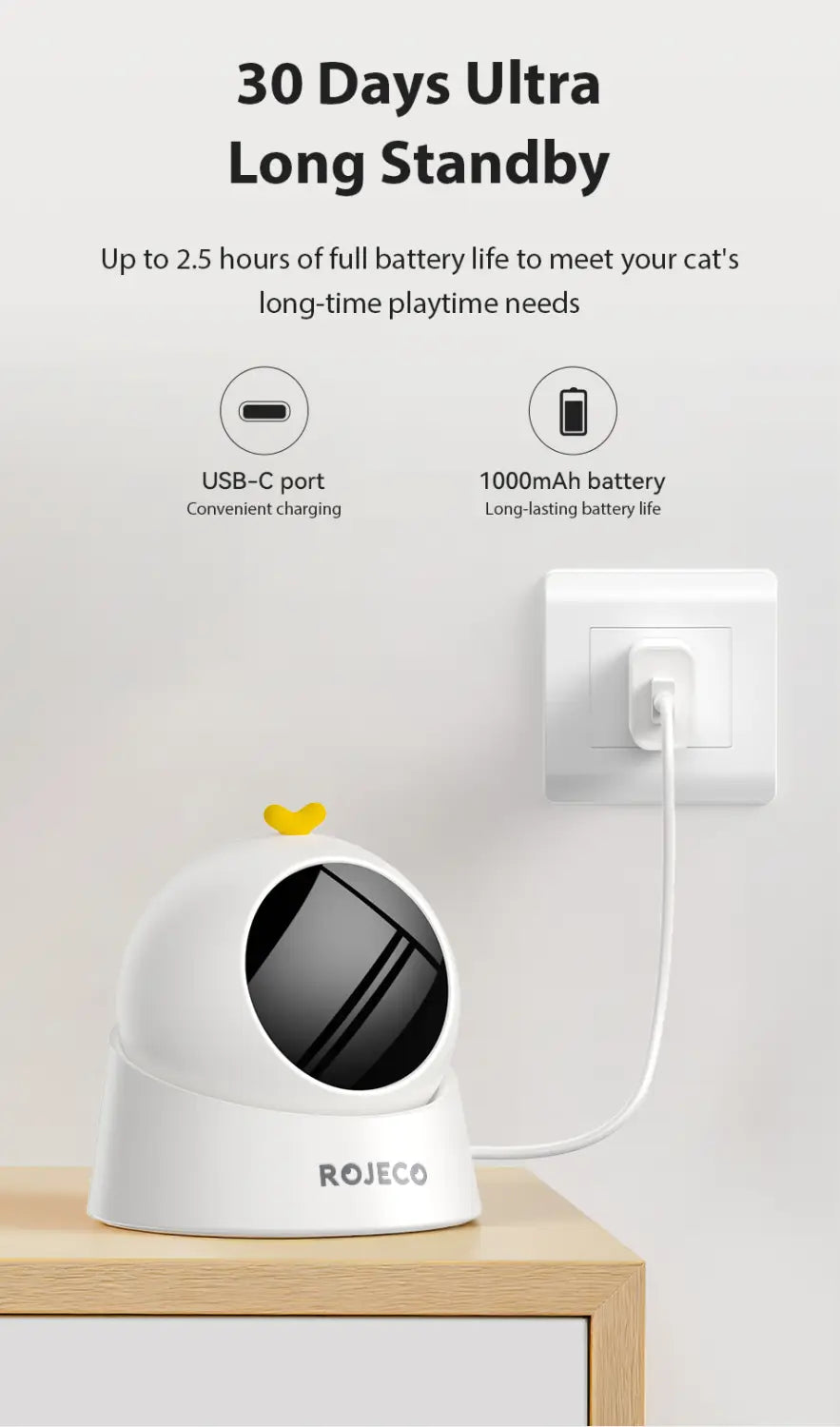 White dome-shaped interactive laser cat toy with yellow cat ear detail and rojeco branding at the base shown from the front.