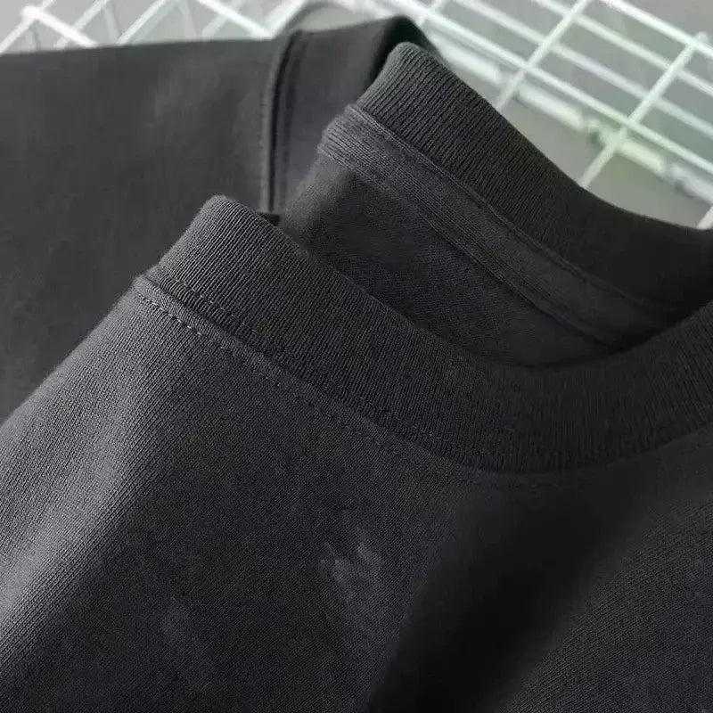 Black cotton t-shirt with ribbed crew neck featuring a funny insomnia graphic for dark humor sleep tee.