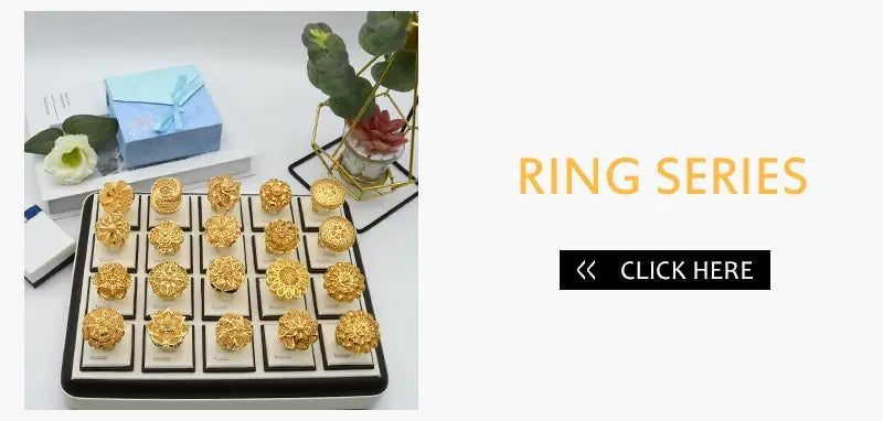 a gold plated 24k gold floral ring set displayed in a black and white presentation tray highlighting dubai jewelry craftsmanship